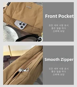 Détail du sac seau bandoulière kaki avec poche avant pour téléphone et fermeture éclair