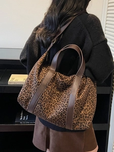 Large leopard print tote bag with brown leather straps for autumn winter commute style