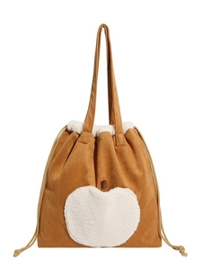 Brown faux suede tote bag with white plush apple patch and drawstring closure