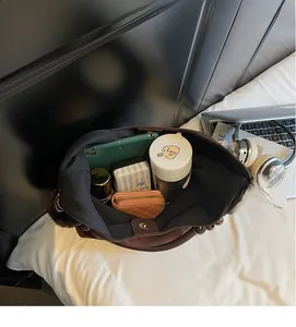 Top view of spacious brown suede tote bag showing large interior storage for daily items
