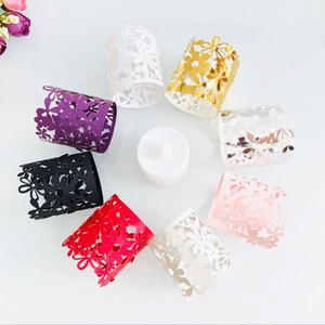 Set of 8 colorful laser-cut hollow lace candle wrappers with white LED tea light centerpiece