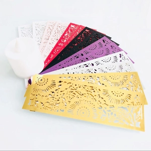 Laser cut paper wraps for LED candles with elegant floral patterns in various colors