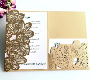 Detail of laser-cut petal lace wedding invitation with kraft paper finish and white insert