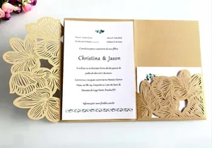 Detailed laser cut floral lace wedding invitation with gold intricate hollow out pattern