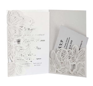 Laser cut white floral wedding invitation set with RSVP card and pocket fold design