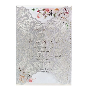 Detailed silver glitter laser-cut floral invitation with elegant rose inner card insert