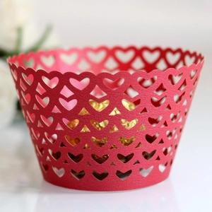 Red laser-cut heart pattern cupcake wrappers for wedding and festive baking decoration