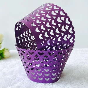Elegant purple pearl cardstock cupcake wrapper with laser-cut heart pattern decoration