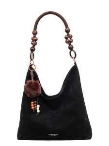 Sac hobo en daim noir avec poignée tressée et détails de pompons de perles ethniques
