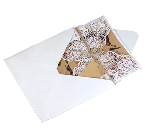 Laser cut lace wedding invitation with kraft paper inner card and rustic twine bow