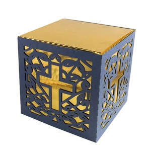Laser-cut navy blue and gold wedding favor box with cross and vine hollow pattern