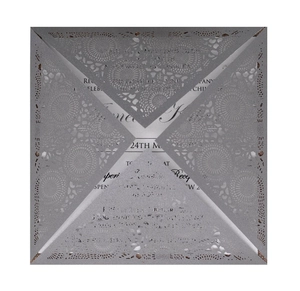 Silver laser-cut floral wedding invitations with elegant pearl finish and white card inserts