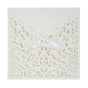Elegant ivory laser cut wedding invitation card with white satin bow decoration