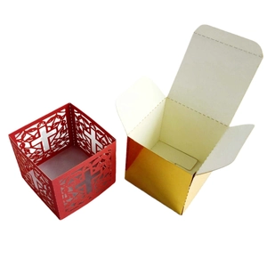 Laser-cut pearl paper candy boxes with hollow cross pattern and golden gift box set