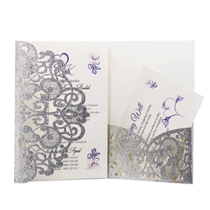 Elegant laser cut silver glitter wedding invitation with purple floral inner card detail