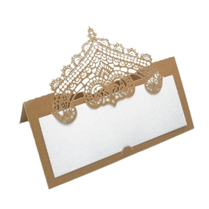 Elegant laser cut crown lace place card with kraft paper base and white insert card