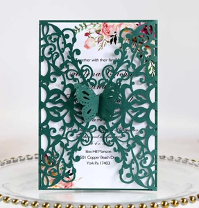 Laser cut wedding invitation with dark green hollow pattern and floral inner card