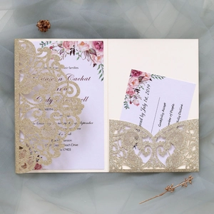 Detailed laser-cut gold glitter wedding invitation with elegant floral insert and RSVP card