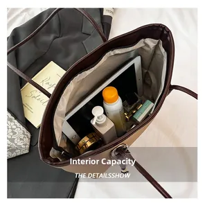 Interior view showing large capacity for tablet and cosmetics in a contrast tote bag