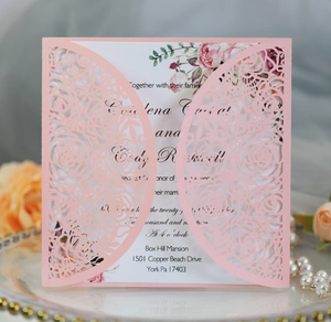 Pink laser-cut rose wedding invitation card with floral insert and elegant pearl decor
