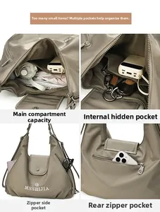 Detail view showing four storage compartments and waterproof nylon material of the khaki tote