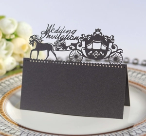 Detailed laser-cut black carriage wedding place card with elegant镂空invitation design