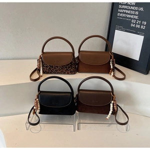 Showcase of minimalist crossbody bags in leopard print, brown, black, and suede leather finishes