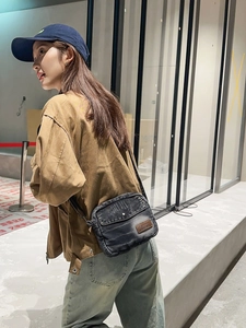 Retro denim shoulder bag in charcoal grey with leather patch and flap pocket for women