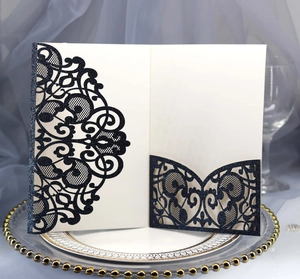 Intricate laser-cut navy blue glitter invitation cover with delicate lace hollow pattern