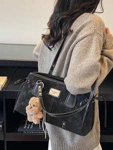 Retro black suede tote bag with white stitching and cute bear pendant for office women