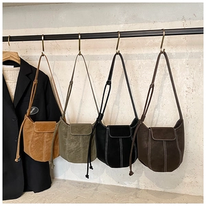 Detailed comparison of camel, olive, black and brown retro textured crossbody bucket bags