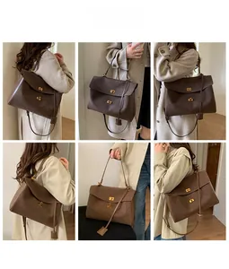 Detailed views of dark brown suede tote bag with gold buckles and chic shoulder straps
