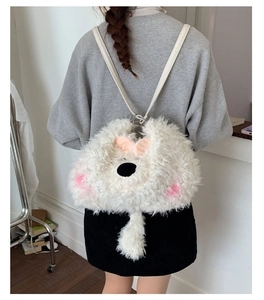 Detailed back view of a white plush animal backpack with soft faux rabbit fur and leather straps