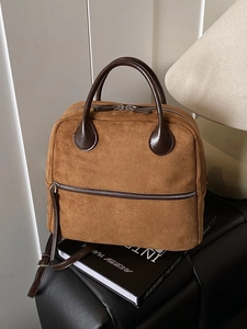 Sac à dos en daim marron avec coutures vintage et grande capacité pour le voyage