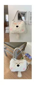 Detail of cute cream plush teddy bear bag with pink ear accents and soft faux fur texture