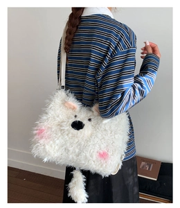 Detail of white fluffy bear plush bag showing soft faux fur texture and cute 3D ears
