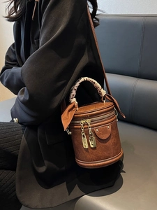 Vintage brown cylindrical shoulder bag with leopard scarf handle and gold zipper