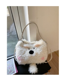 Close-up of white plush animal bag with soft faux fur texture and pink blush detail