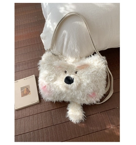 Detail of cute white plush bear crossbody bag with soft faux fur and leather strap