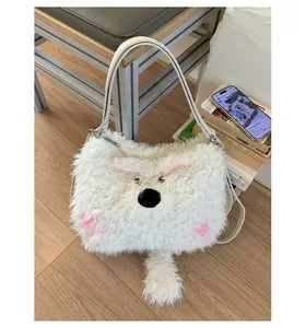 Detail of white plush cartoon animal bag showing soft faux fur texture and embroidery