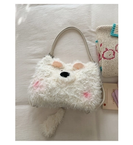 Detailed close-up of fluffy animal-themed plush handbag with 3D ears and cute facial features