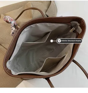Macro view of interior structure of brown tote bag with pockets and floral scarf detail