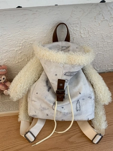Cute off-white bunny shape backpack with plush ears and leather strap accents