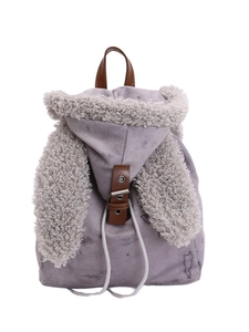 Grey canvas backpack with cute rabbit ears and brown leather buckle in a front view