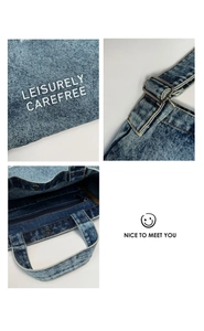 Close-up of denim bucket bag with metal buckle and detailed internal zip pocket