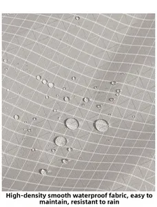 Detailed macro view of high-density waterproof grey grid fabric with water droplets