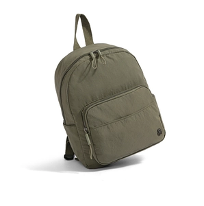Close-up of olive green nylon backpack featuring metal logo and sturdy zippers