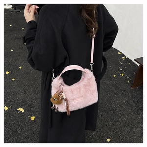 Pink plush faux fur bag with leather handles and cute leopard print bear charm