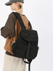 Fashionable black large capacity student backpack with flap buckle and multi-pocket design