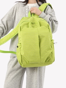 Neon lime green checkered backpack for women with laptop compartment and side pockets